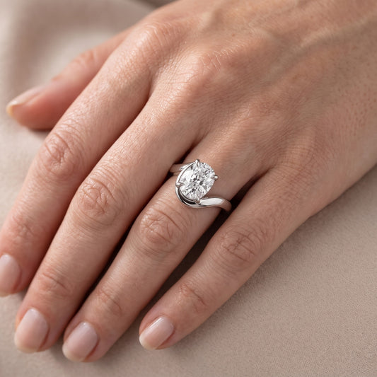 Margaux Bypass Solitaire Cushion Diamond Engagement Ring in Platinum - lifestyle.jpg