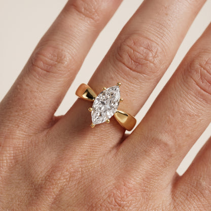 Talia Solitaire Twist Marquise Diamond Engagement Ring in Yellow Gold - lifestyle.jpg