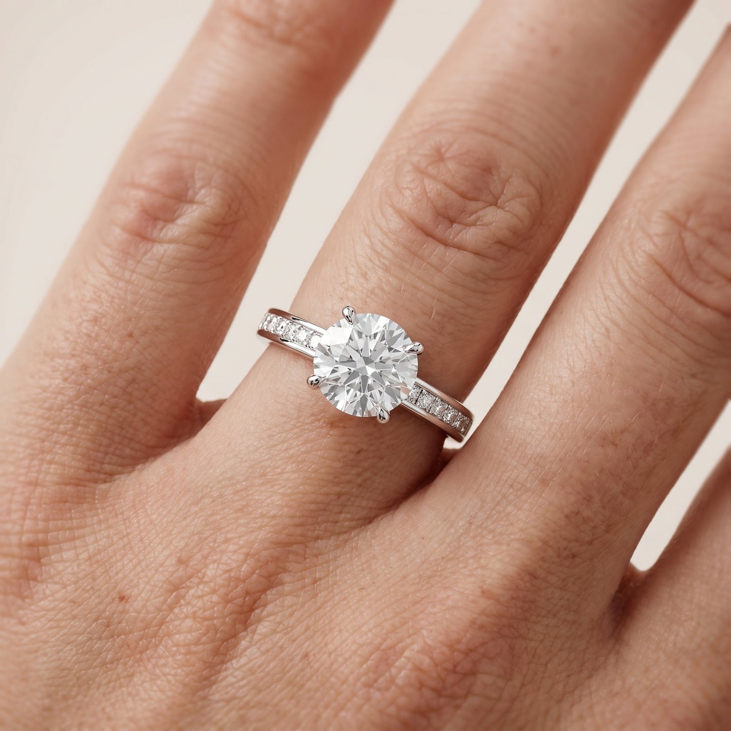 Maren Sidestone Channel Set Round Diamond Engagement Ring in Platinum - lifestyle.jpg