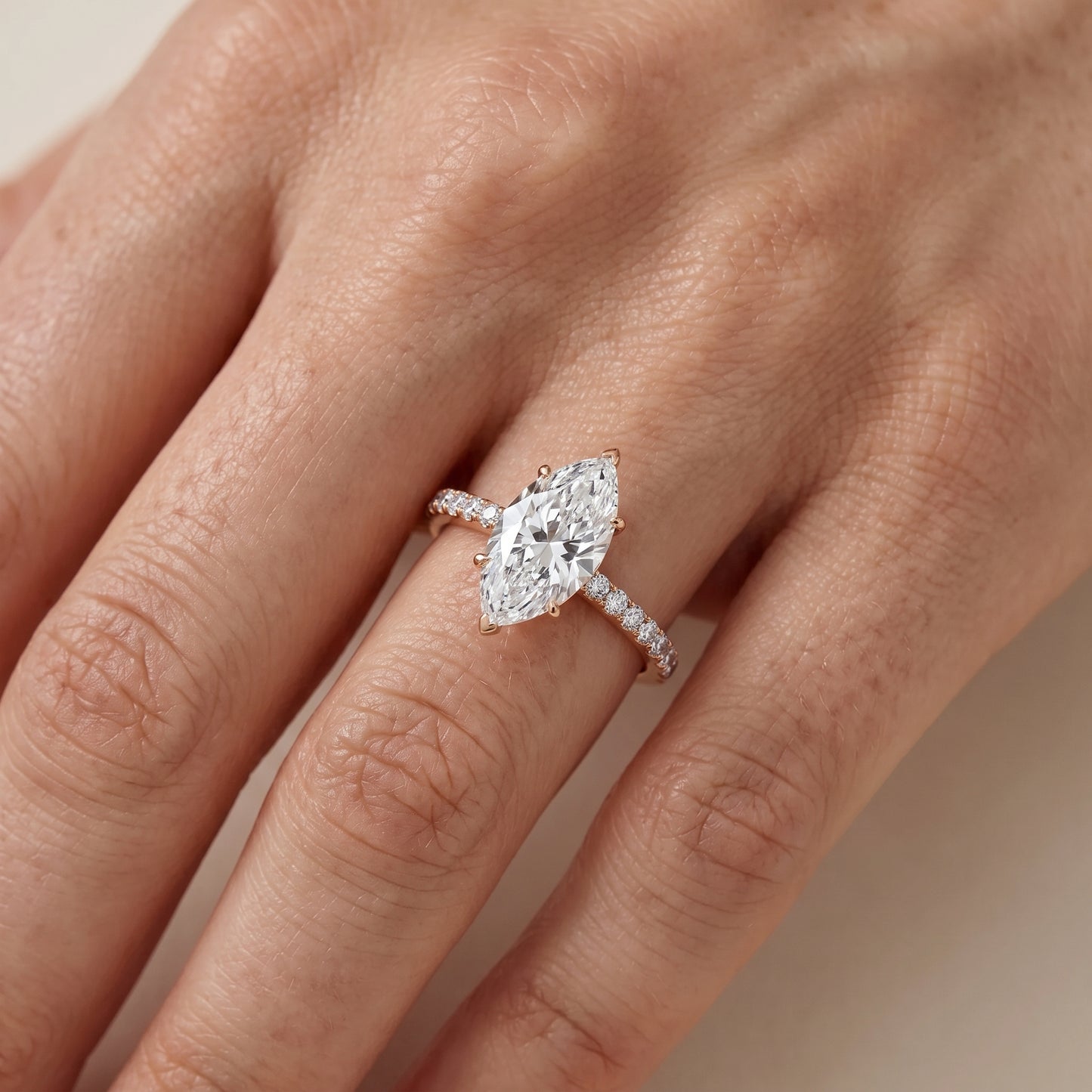 Juna French Pavé Solitaire Marquise Diamond Engagement Ring in Rose Gold - lifestyle.jpg