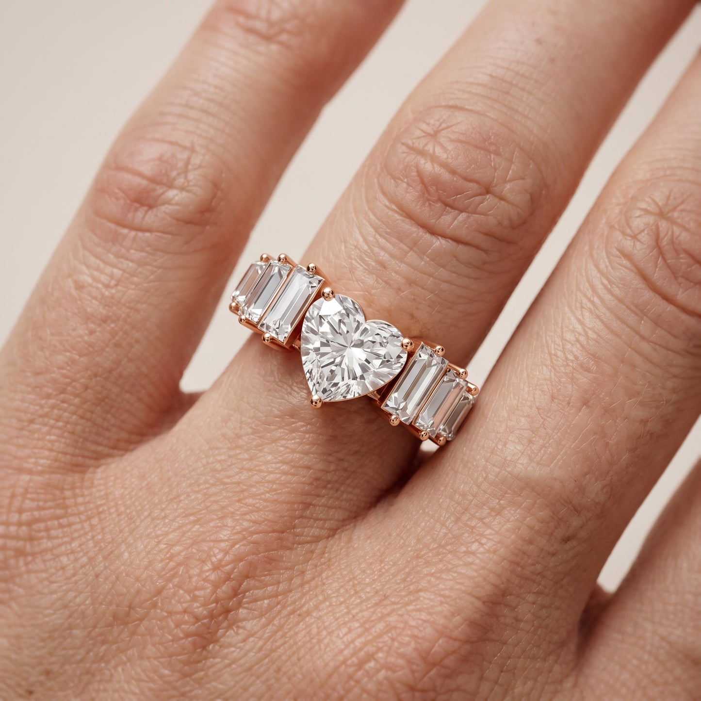 Mara Sidestone Baguette Accent Heart Diamond Engagement Ring in Rose Gold - lifestyle.jpg