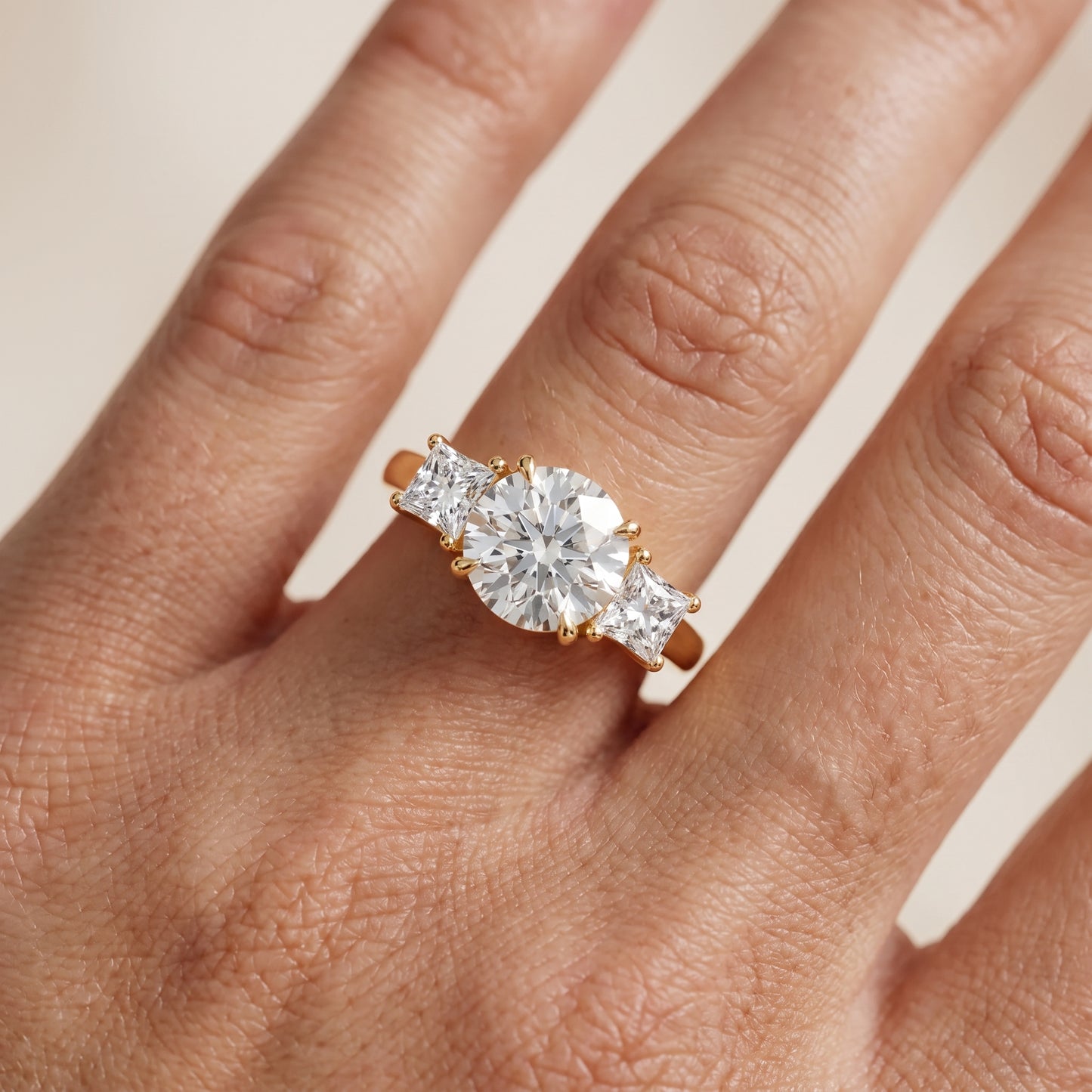 Sienna Three-Stone Round Diamond Ring in Yellow Gold - lifestyle.jpg
