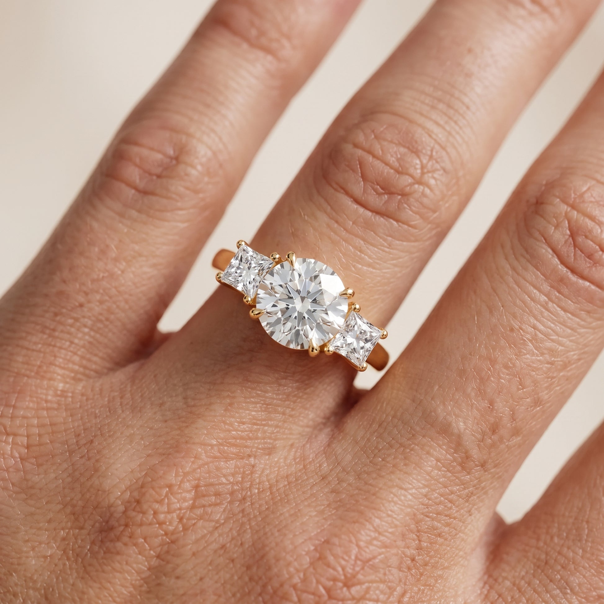 Sienna Three-Stone Round Diamond Ring in Yellow Gold - lifestyle.jpg