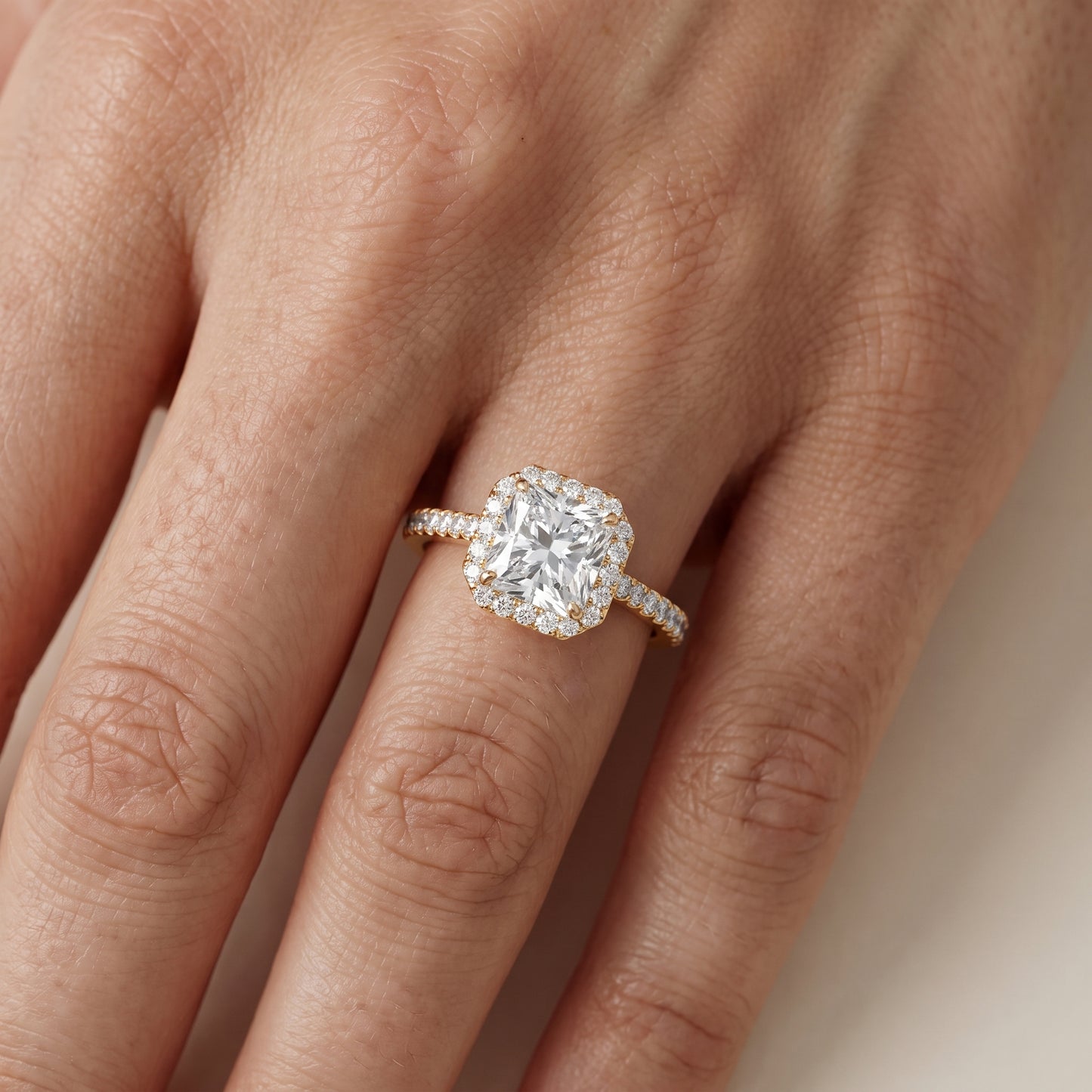 Willa Halo Micropavé Radiant Diamond Engagement Ring in Yellow Gold - lifestyle.jpg