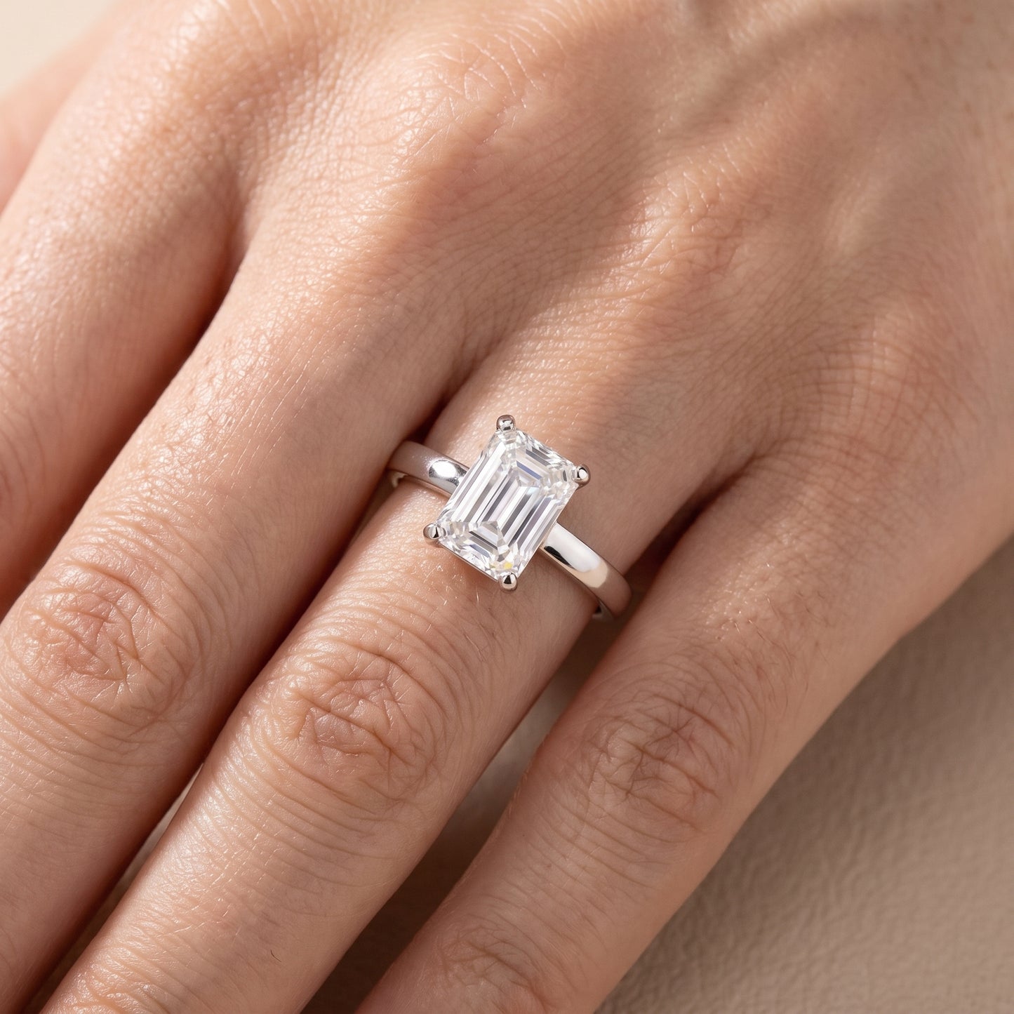 Delia Solitaire Emerald Diamond Engagement Ring in White Gold - lifestyle.jpg