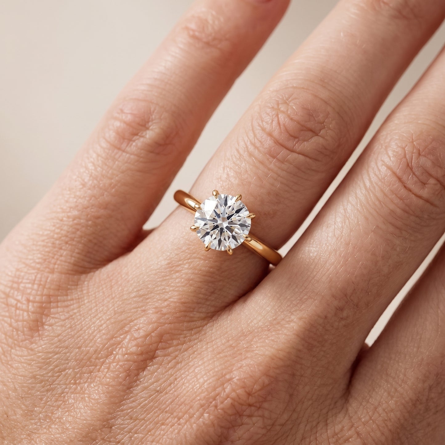 Evie Solitaire Six-Prong Round Diamond Engagement Ring in Yellow Gold - lifestyle.jpg