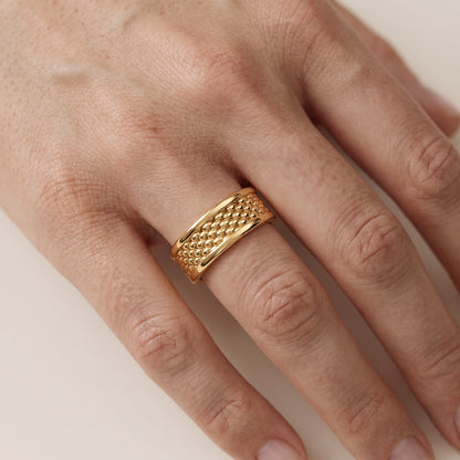 Cordelia Carved Step Edge Wedding Band in Yellow Gold - lifestyle.jpg
