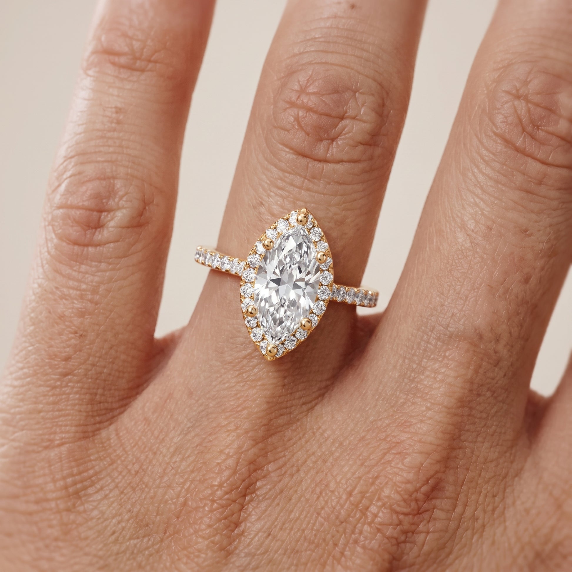 Sophie Halo Pavé Marquise Diamond Ring in Yellow Gold - lifestyle.jpg