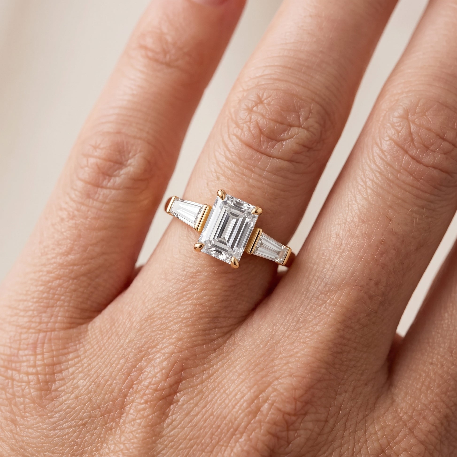 Layla Tapered Baguette Emerald Diamond Ring in Yellow Gold - lifestyle.jpg