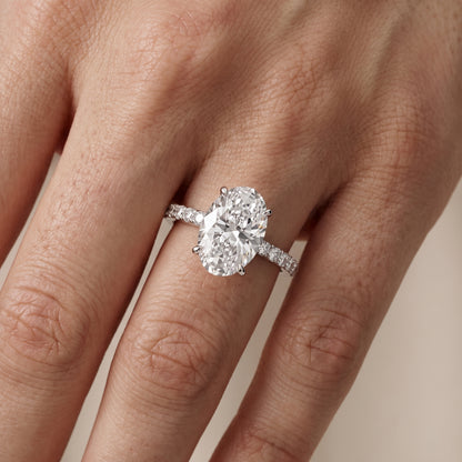 Novara Solitaire Pavé Oval Diamond Ring in Platinum - lifestyle.jpg