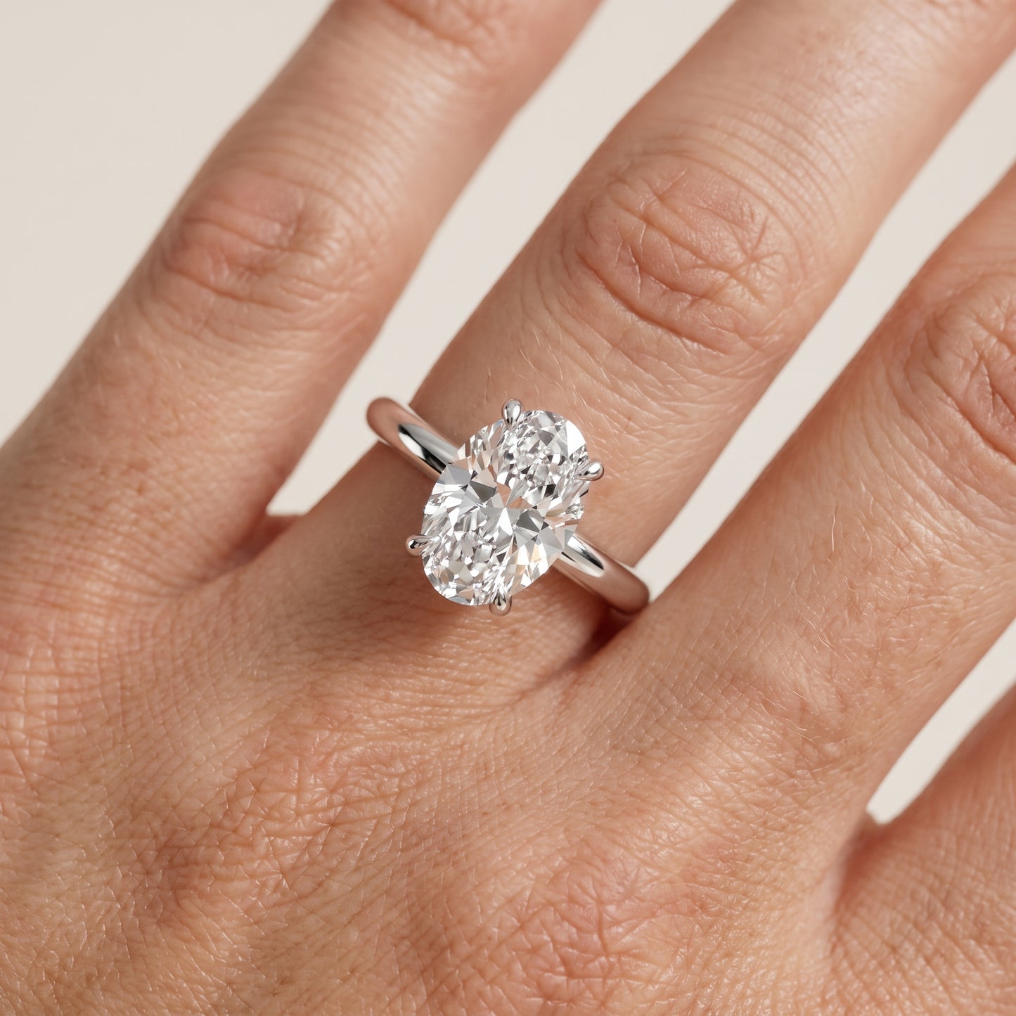 Amaya Hidden Halo Oval Diamond Ring in Platinum - lifestyle.jpg