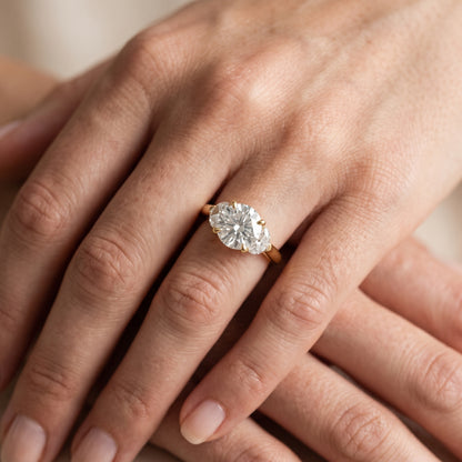 Elia Half-Moon Three-Stone Round Diamond Engagement Ring in Platinum - lifestyle.jpg