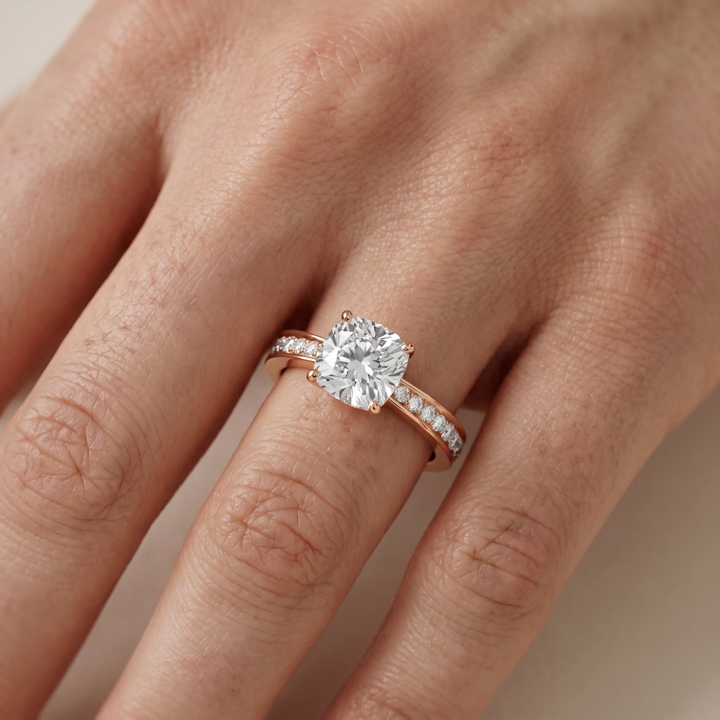 Rhea Sidestone Pavé Cushion Diamond Engagement Ring in Rose Gold - lifestyle.jpg