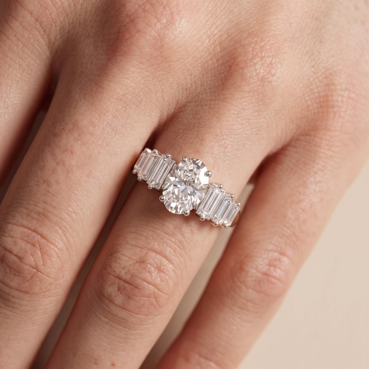 Mara Sidestone Baguette Accent Oval Diamond Engagement Ring in Platinum - lifestyle.jpg