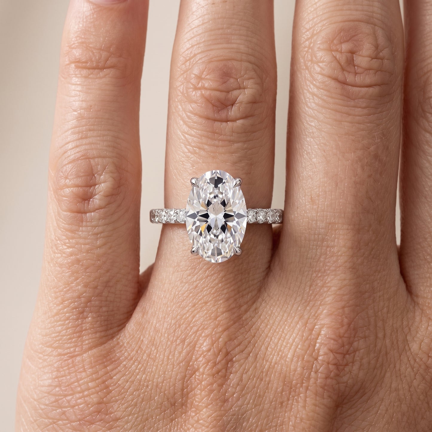 Ione Solitaire Pavé Oval Diamond Engagement Ring in Platinum - lifestyle.jpg