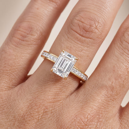Brielle Channel Set Solitaire Emerald Diamond Ring in Yellow Gold - lifestyle.jpg