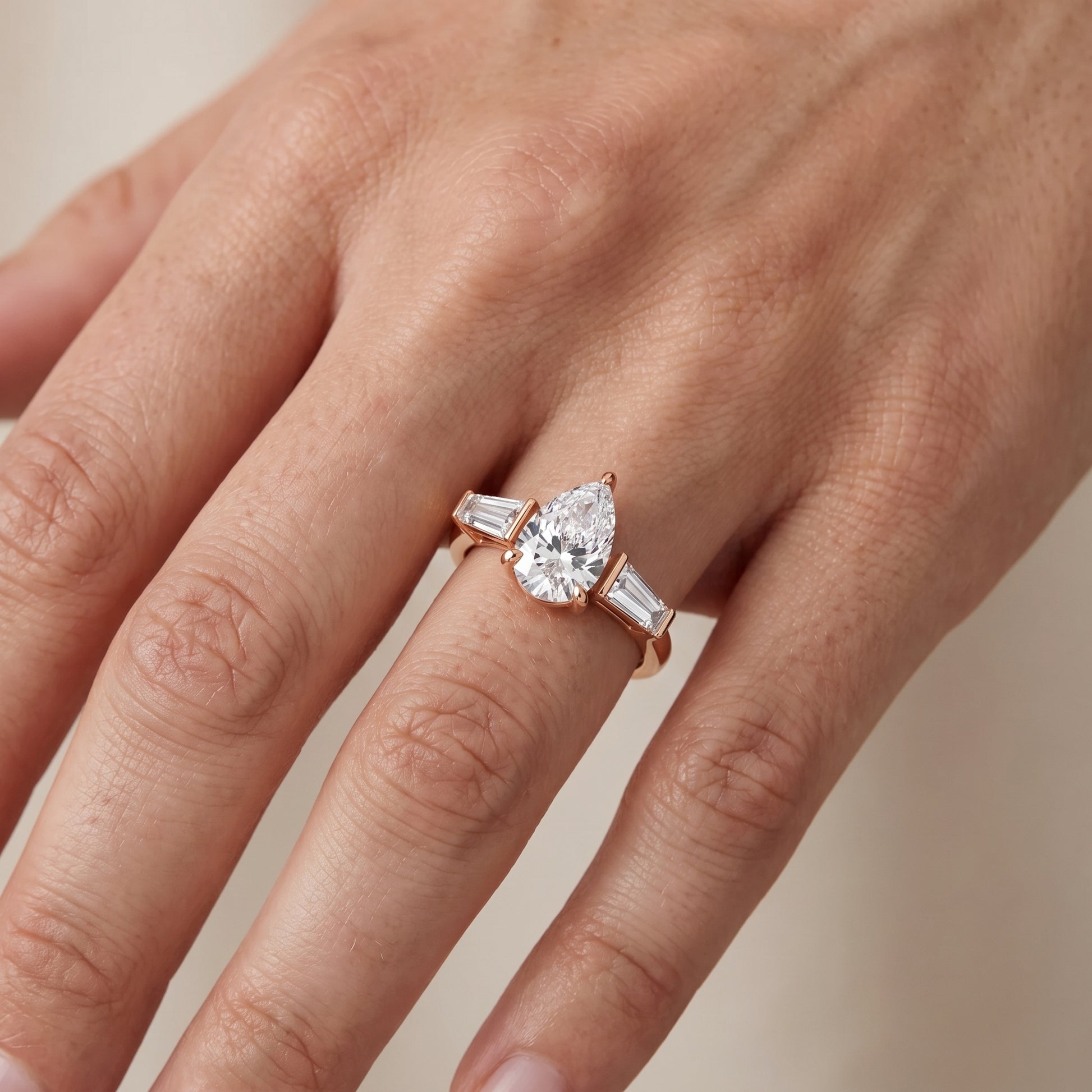 Layla Tapered Baguette Pear Diamond Ring in Rose Gold - lifestyle.jpg