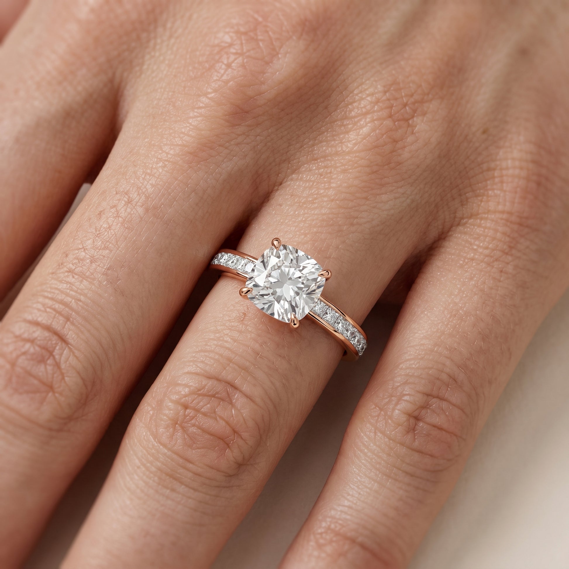 Brielle Channel Set Solitaire Cushion Diamond Ring in Rose Gold - lifestyle.jpg