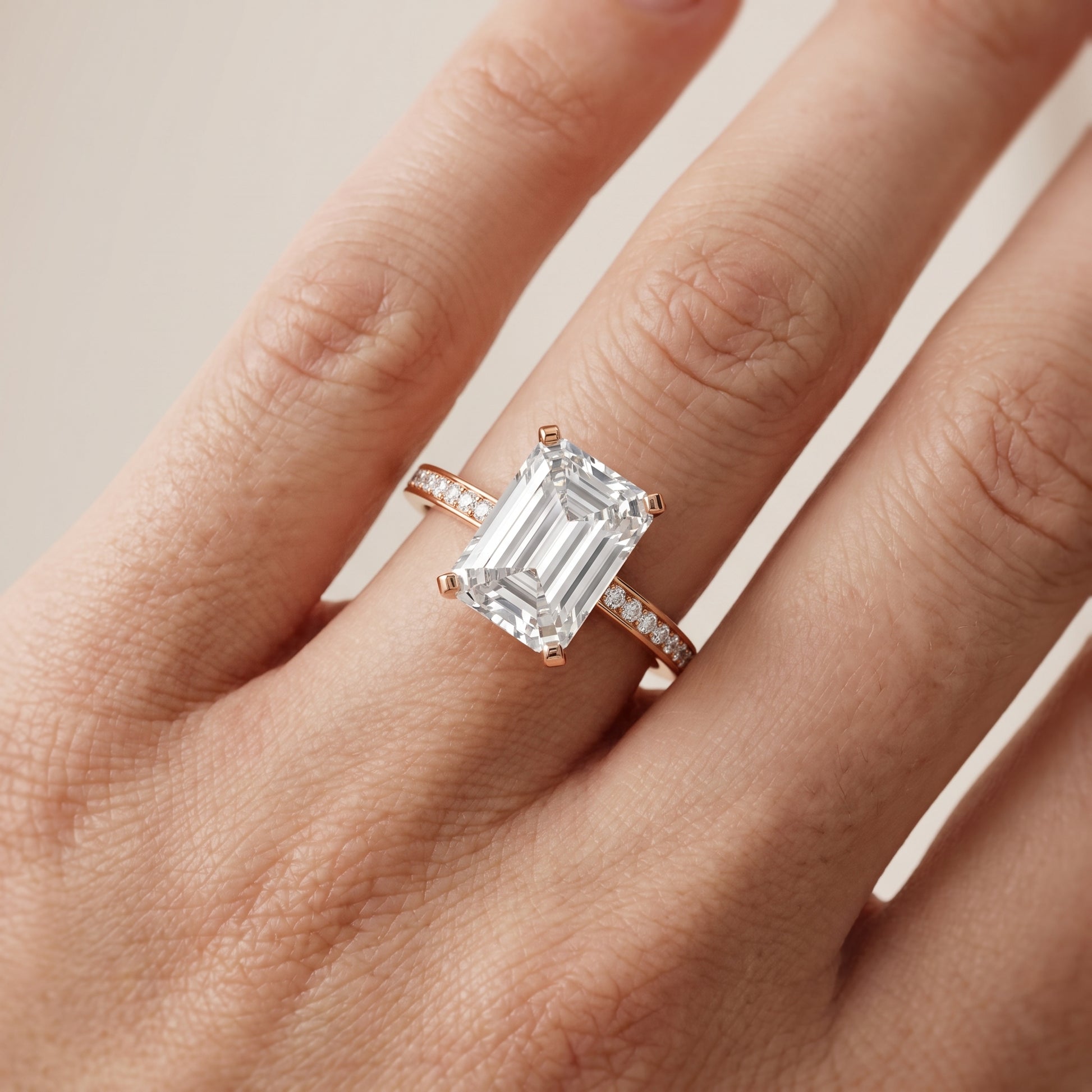 Naia Hidden Halo Emerald Diamond Ring in Rose Gold - lifestyle.jpg