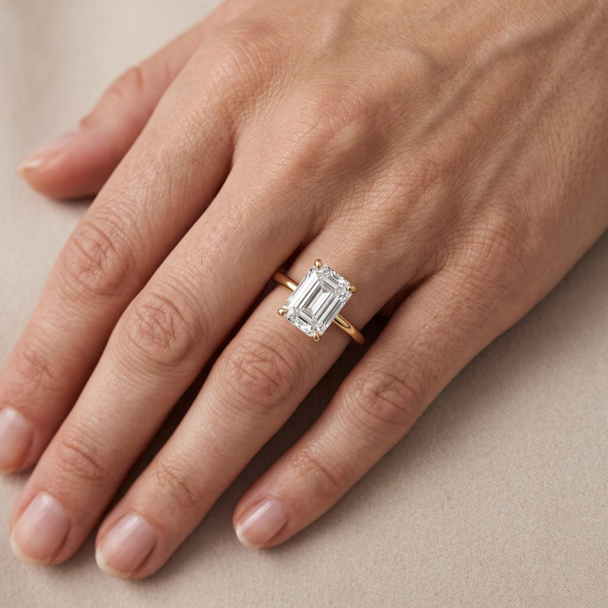 Giulia Solitaire Emerald Diamond Engagement Ring in White Gold - lifestyle.jpg