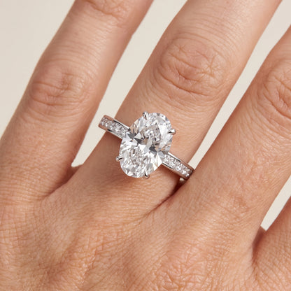 Maren Sidestone Channel Set Oval Diamond Engagement Ring in Platinum - lifestyle.jpg