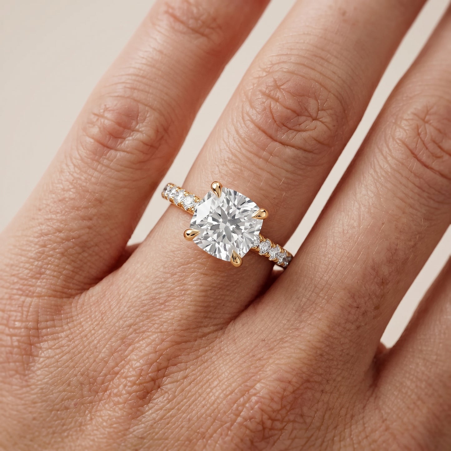 Maya Hidden Halo Pavé Cushion Diamond Engagement Ring in Yellow Gold - lifestyle.jpg