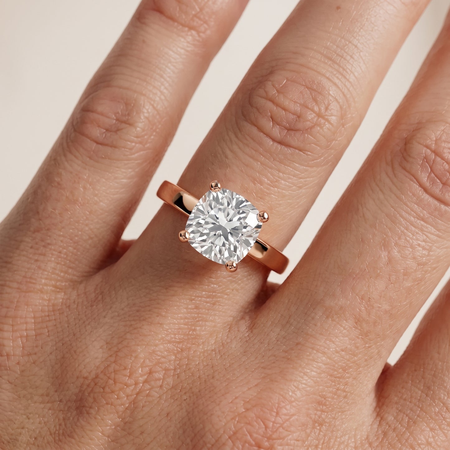 Delia Solitaire Cushion Diamond Engagement Ring in Rose Gold - lifestyle.jpg