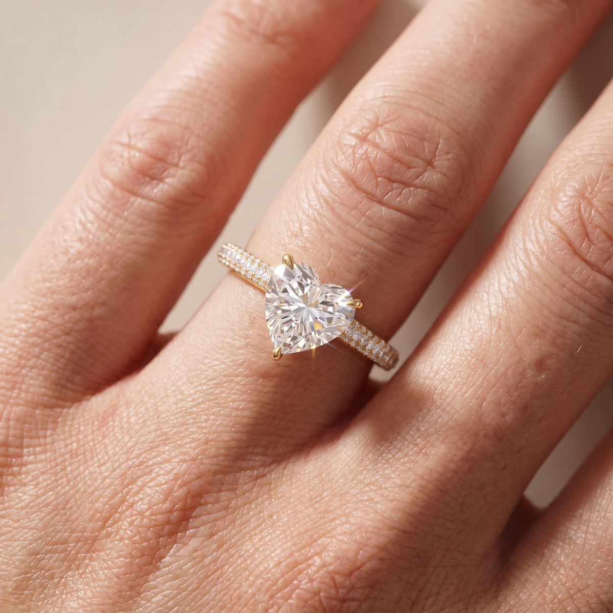 Della Hidden Halo Pavé Heart Diamond Engagement Ring in Yellow Gold - lifestyle.jpg