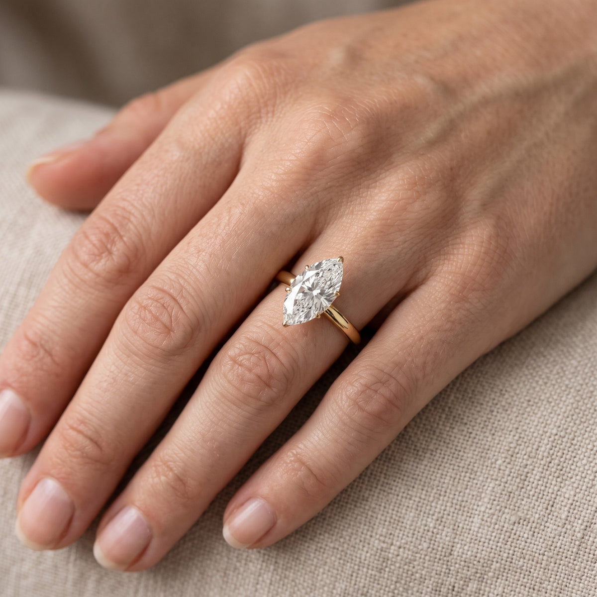 Serena Blossom Marquise Diamond Solitaire Ring in Yellow Gold - lifestyle.jpg