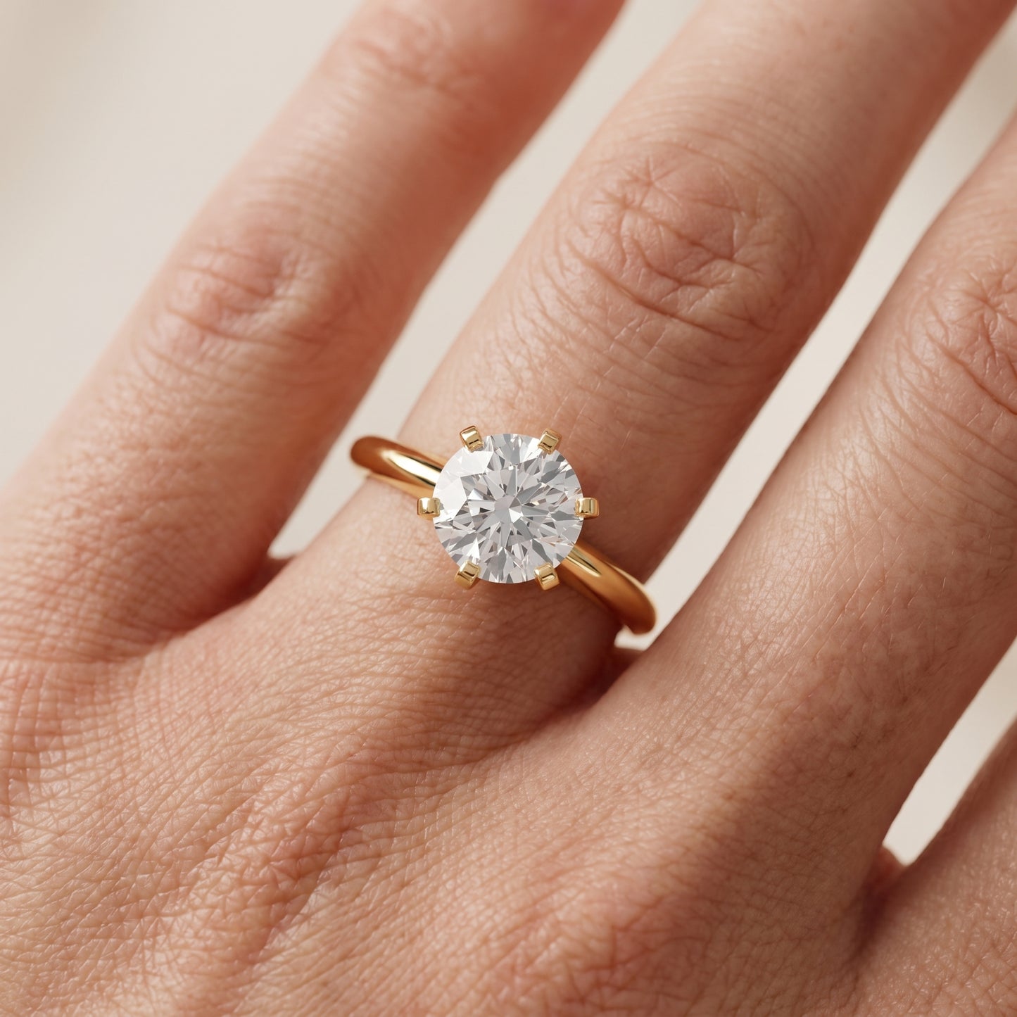 Amira Six-Prong Solitaire Round Diamond Engagement Ring in Yellow Gold - lifestyle.jpg