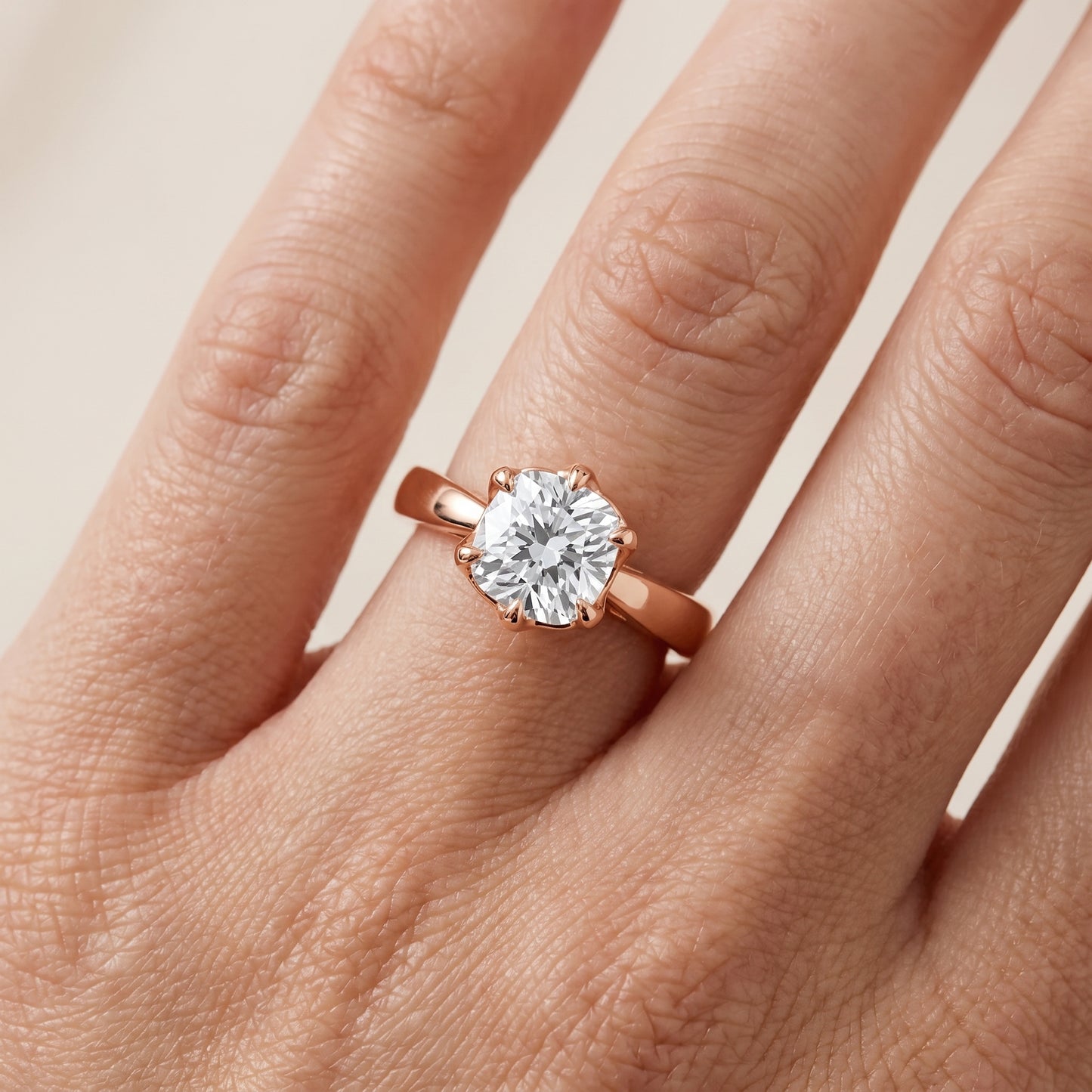 Lucia Solitaire Six-Prong Cushion Diamond Engagement Ring in Rose Gold - lifestyle.jpg