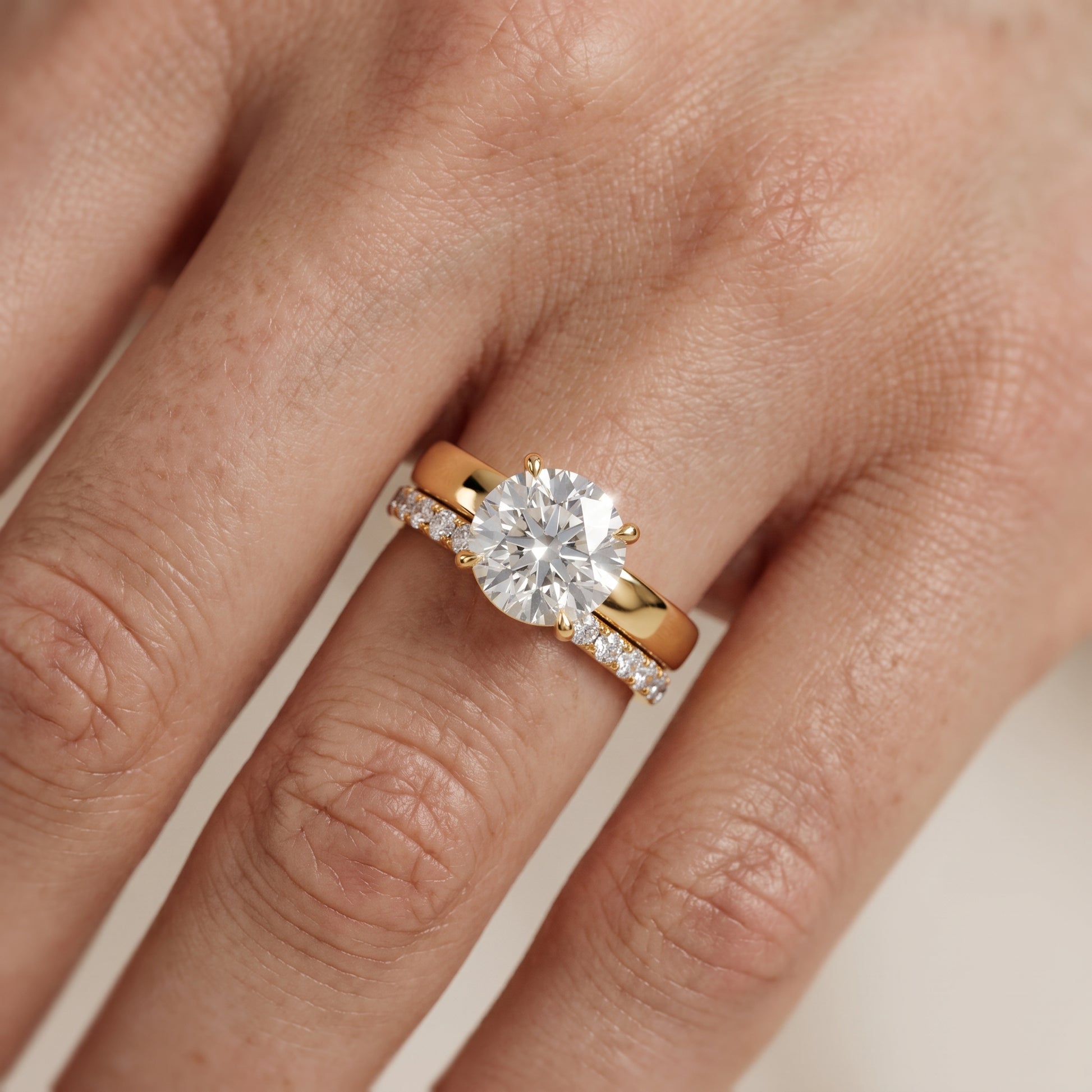 Veda Split Shank Pavé Round Diamond Engagement Ring in Yellow Gold - lifestyle.jpg