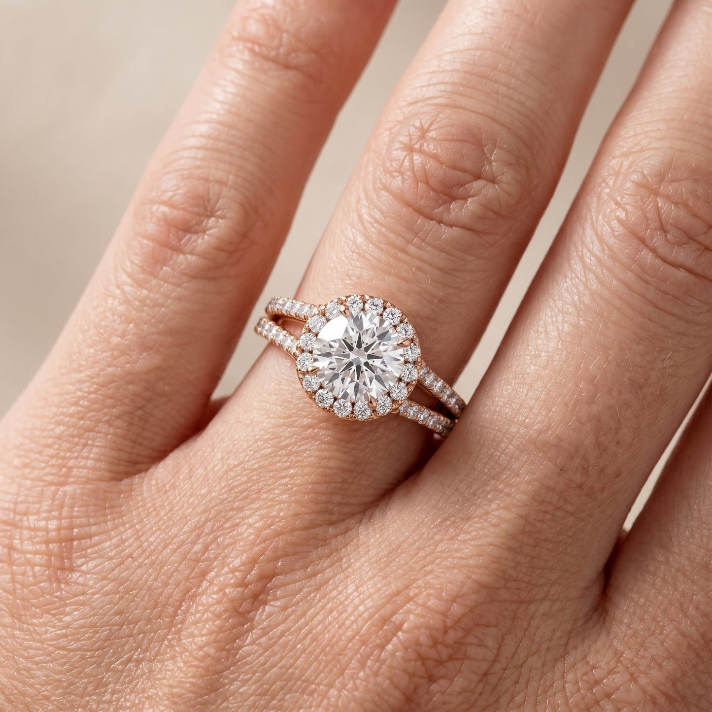Kira Halo Split Shank Round Diamond Engagement Ring in Rose Gold - lifestyle.jpg