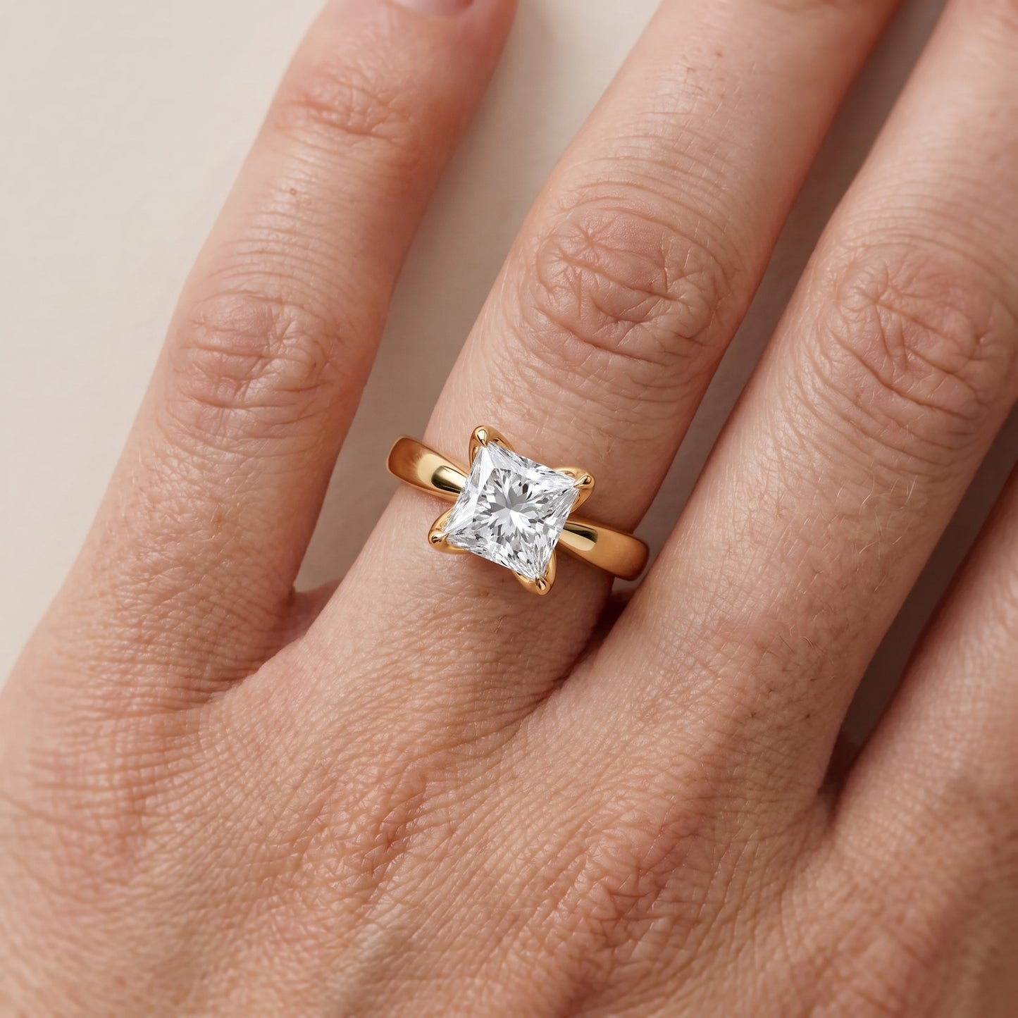 Lucia Solitaire Six-Prong Princess Diamond Engagement Ring in Yellow Gold - lifestyle.jpg
