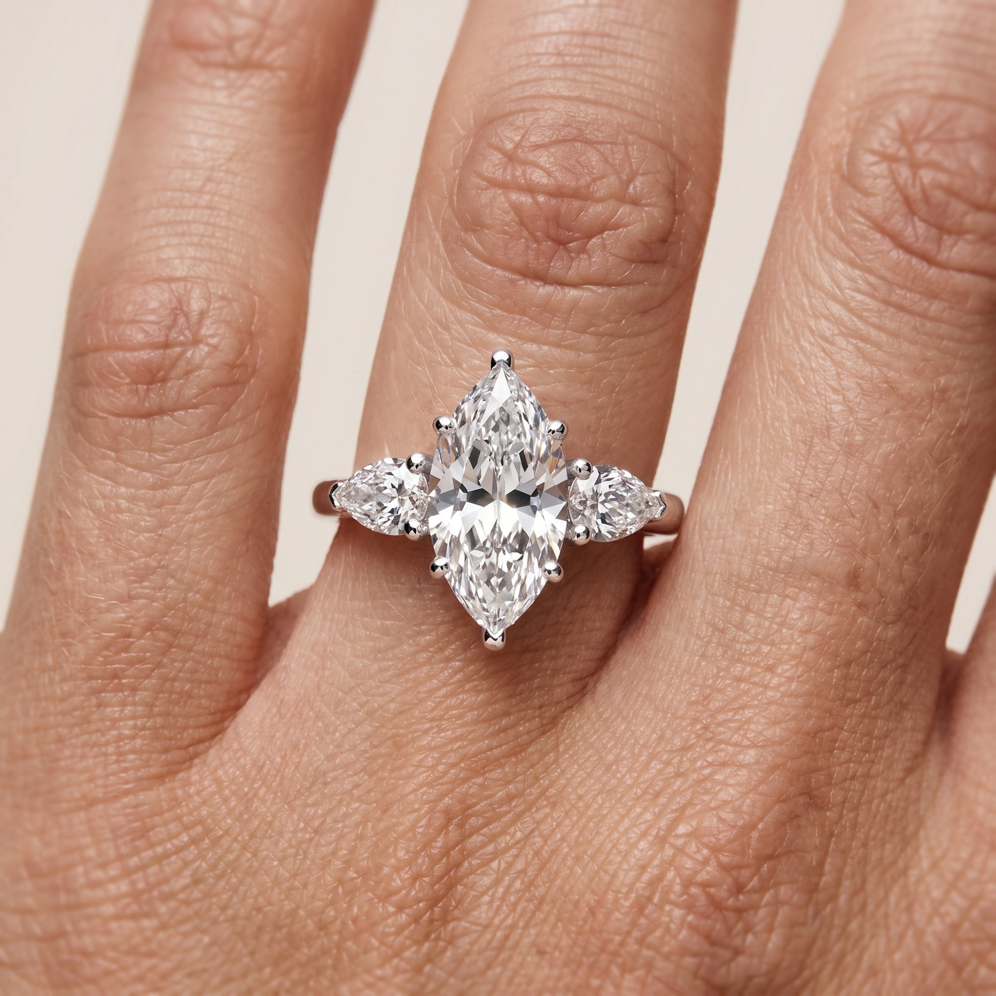 Mirabel Three-Stone Marquise Diamond Engagement Ring in White Gold - lifestyle.jpg