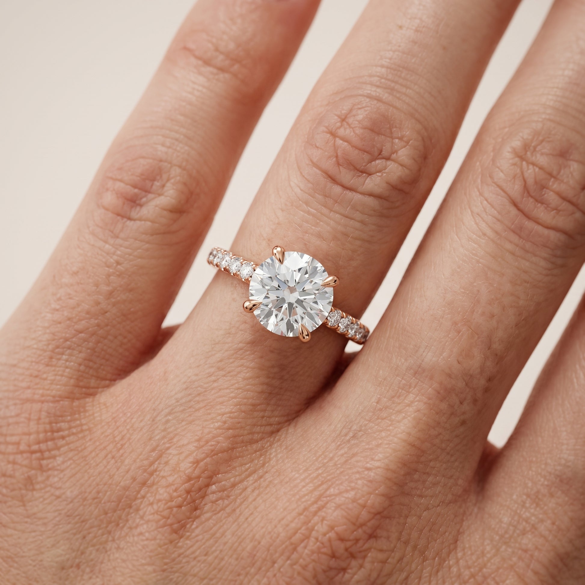 Maya Hidden Halo Pavé Round Diamond Engagement Ring in Rose Gold - lifestyle.jpg