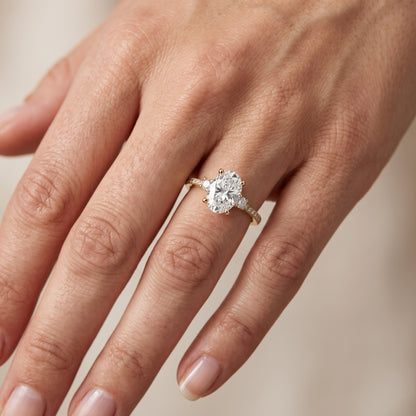 Nerissa Three-Stone Micropavé Oval Diamond Engagement Ring in Yellow Gold - lifestyle.jpg