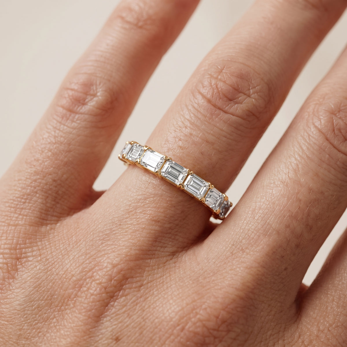 Margot Shared Prong Emerald Diamond Half Eternity Band in Yellow Gold - lifestyle.jpg