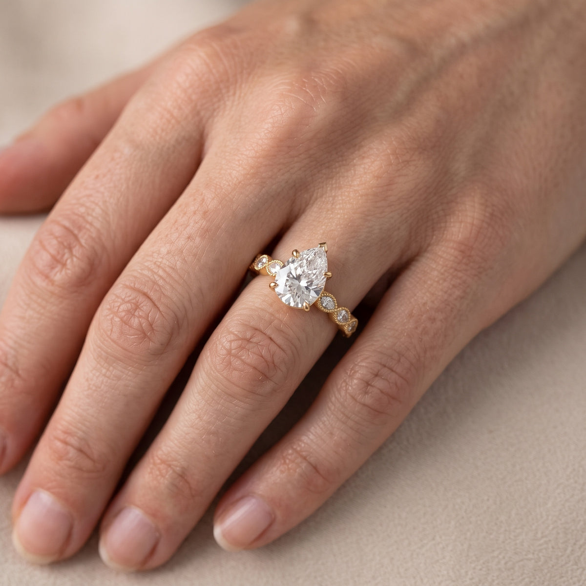Freya Milgrain Leaf Pear Diamond Engagement Ring in Platinum - lifestyle.jpg