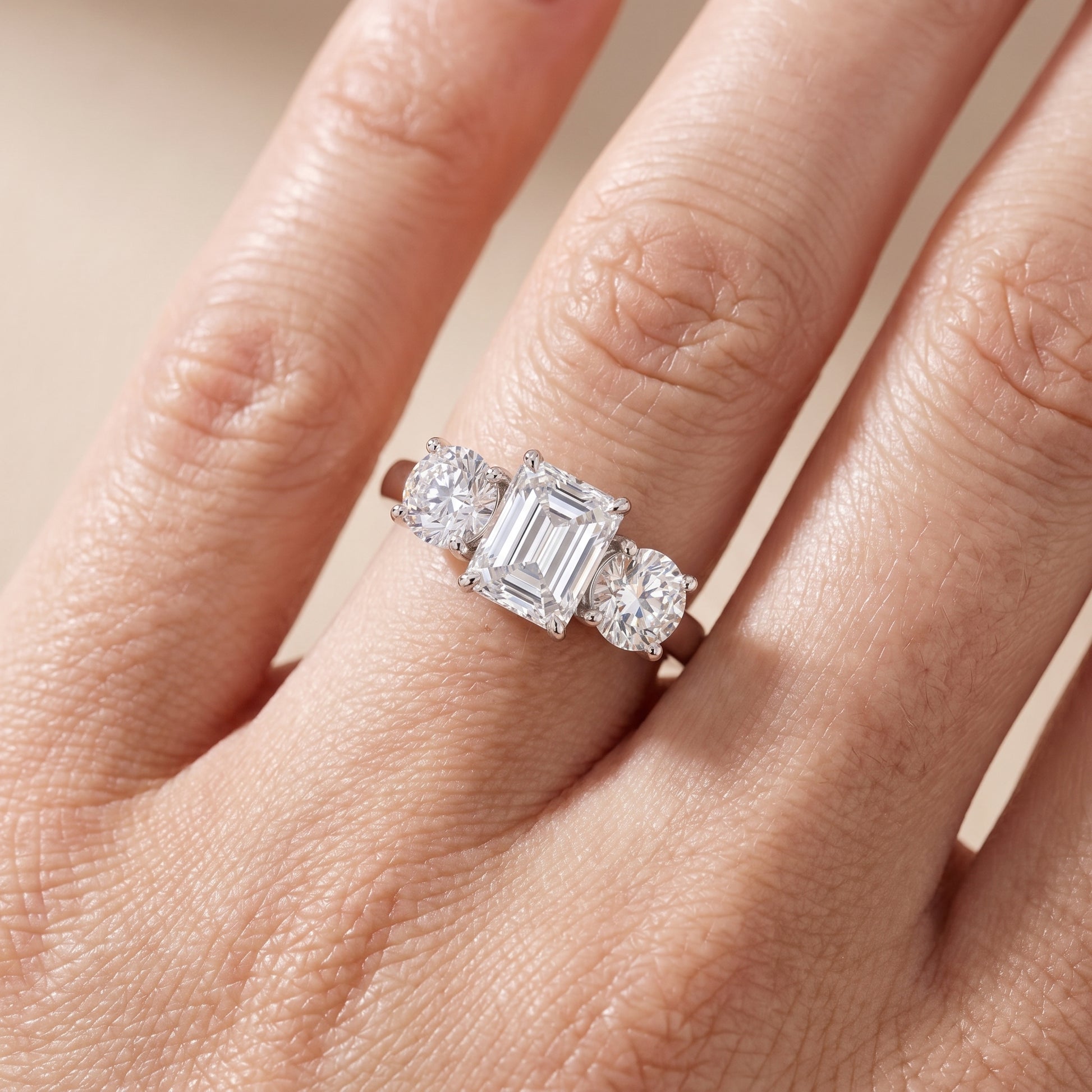 Esme Three-Stone Tapered Emerald Diamond Ring in Platinum - lifestyle.jpg