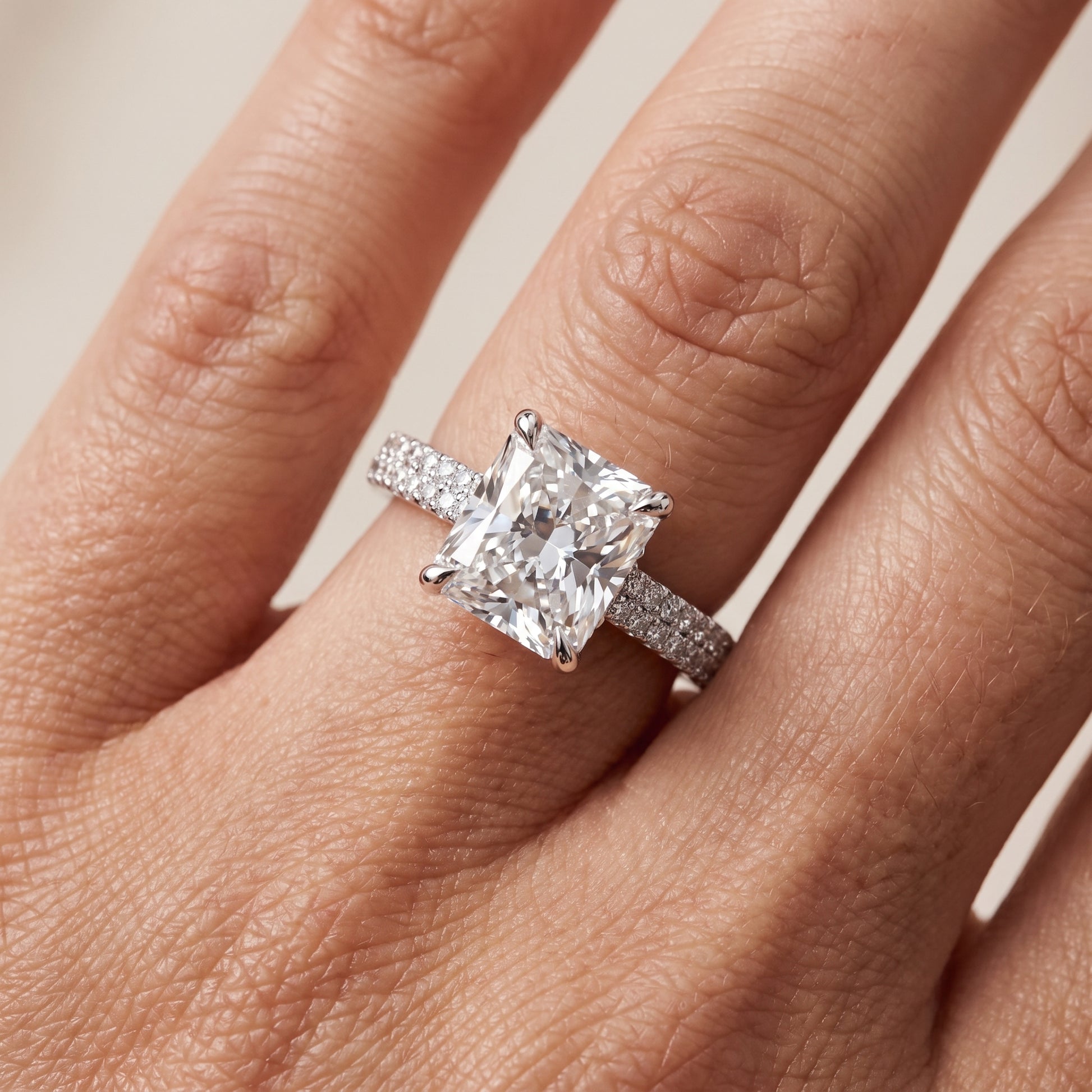 Della Hidden Halo Pavé Radiant Diamond Engagement Ring in Platinum - lifestyle.jpg