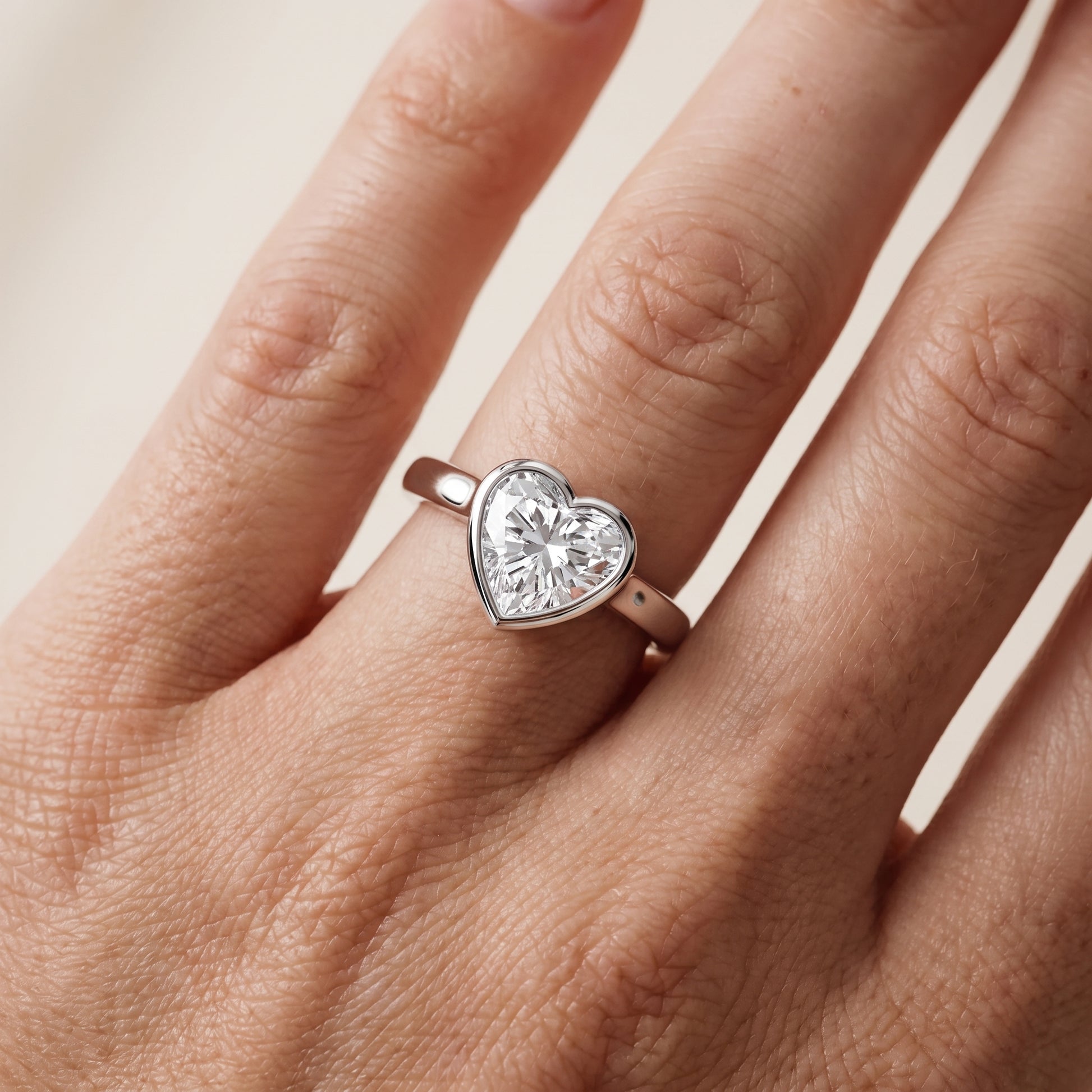 Jolie Bezel Solitaire Heart Diamond Engagement Ring in Silver - lifestyle.jpg