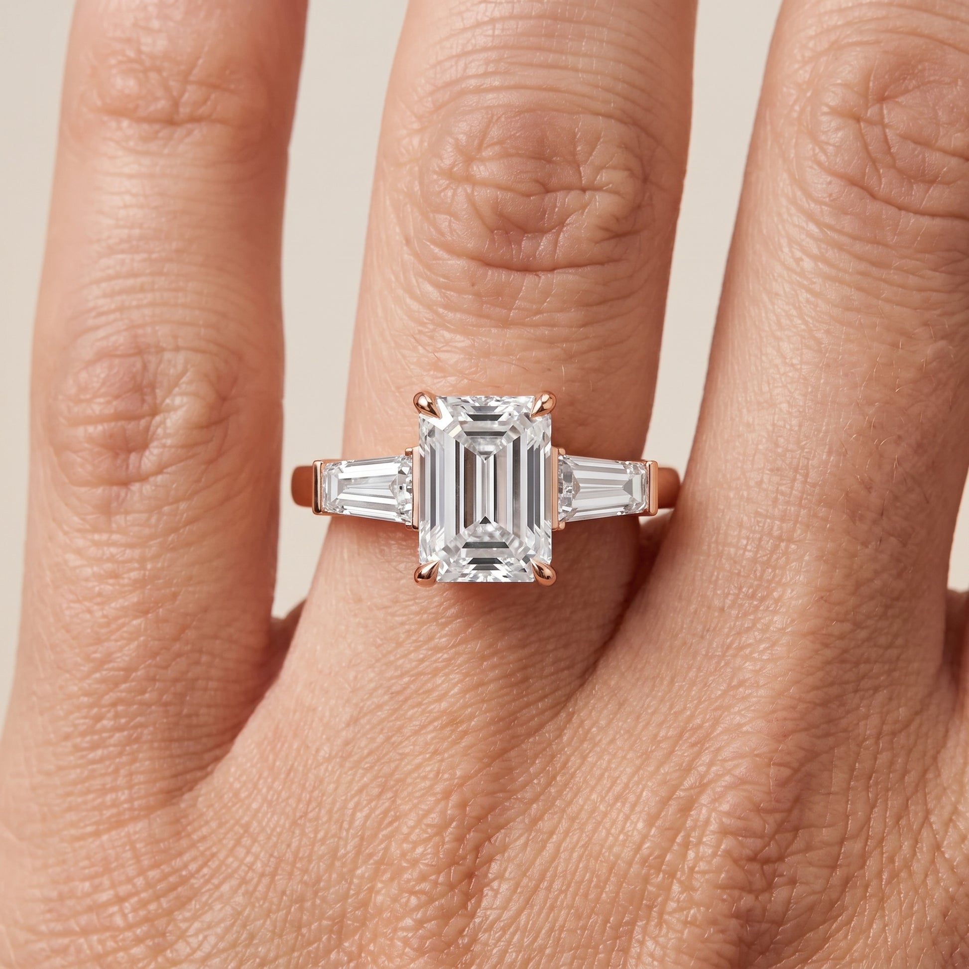 Zelda Tapered Baguette Emerald Diamond Engagement Ring in Rose Gold - lifestyle.jpg