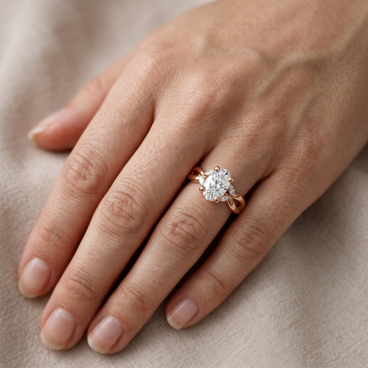 Luna Glow Twisted Oval Diamond Engagement Ring in Rose Gold - lifestyle.jpg