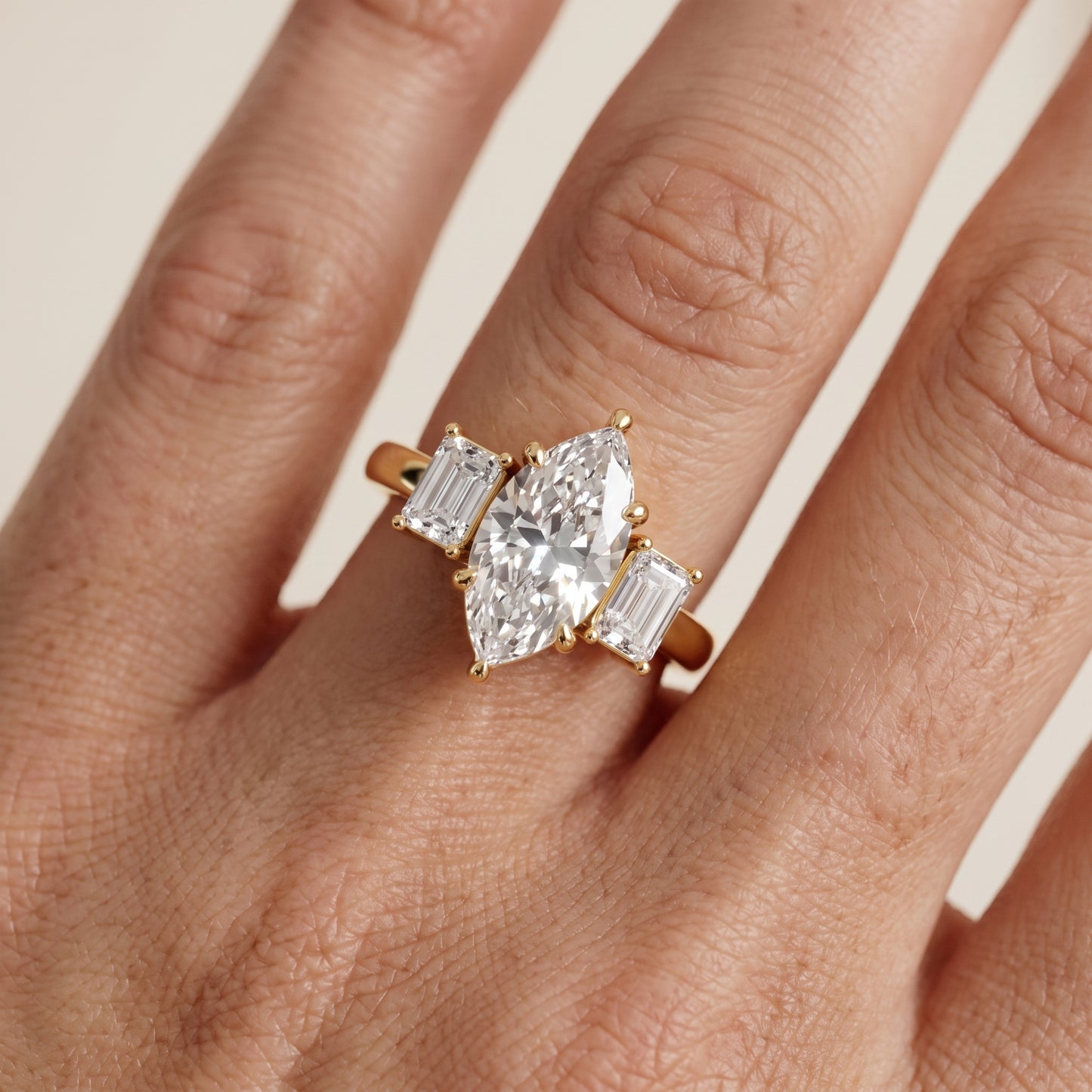 Zoe Three-Stone Marquise Diamond Ring in Yellow Gold - lifestyle.jpg