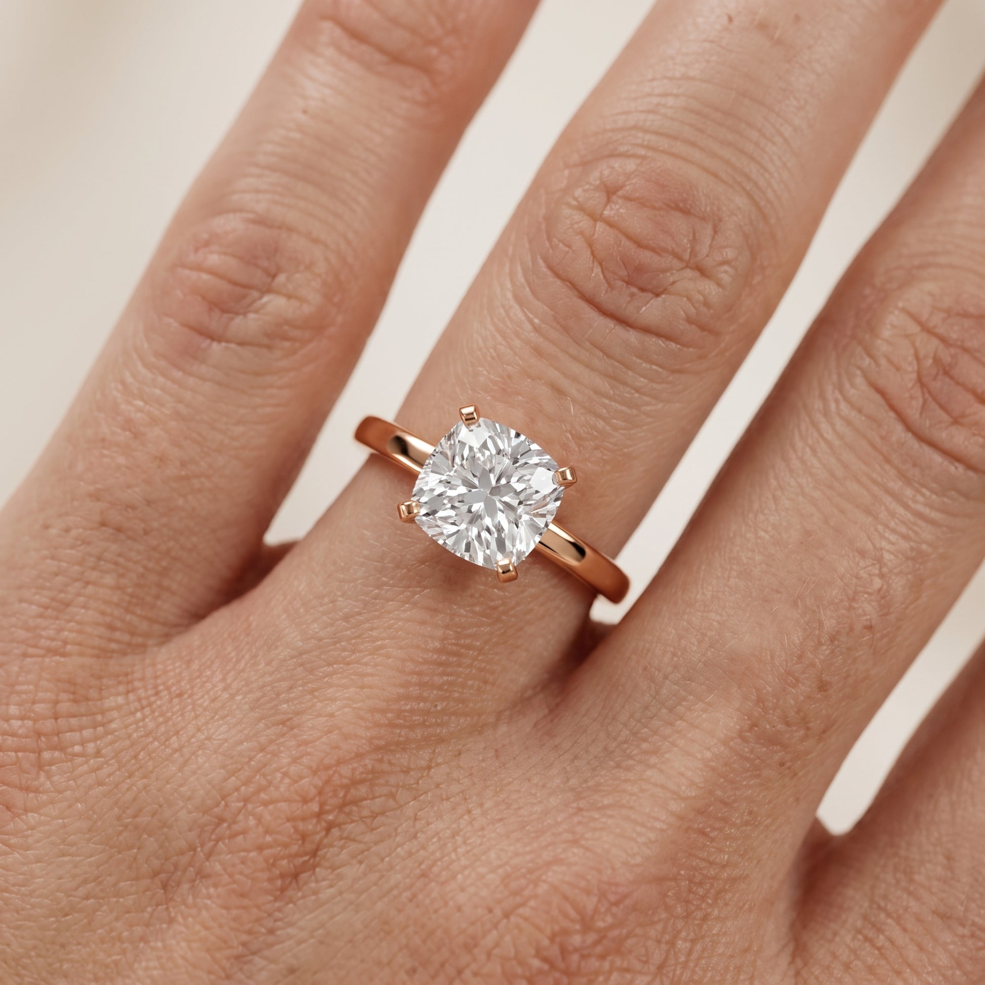 Liana Solitaire Claw Prong Cushion Diamond Engagement Ring in Rose Gold - lifestyle.jpg