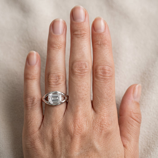 Madeleine Split Shank Emerald Diamond Engagement Ring in Platinum - lifestyle.jpg