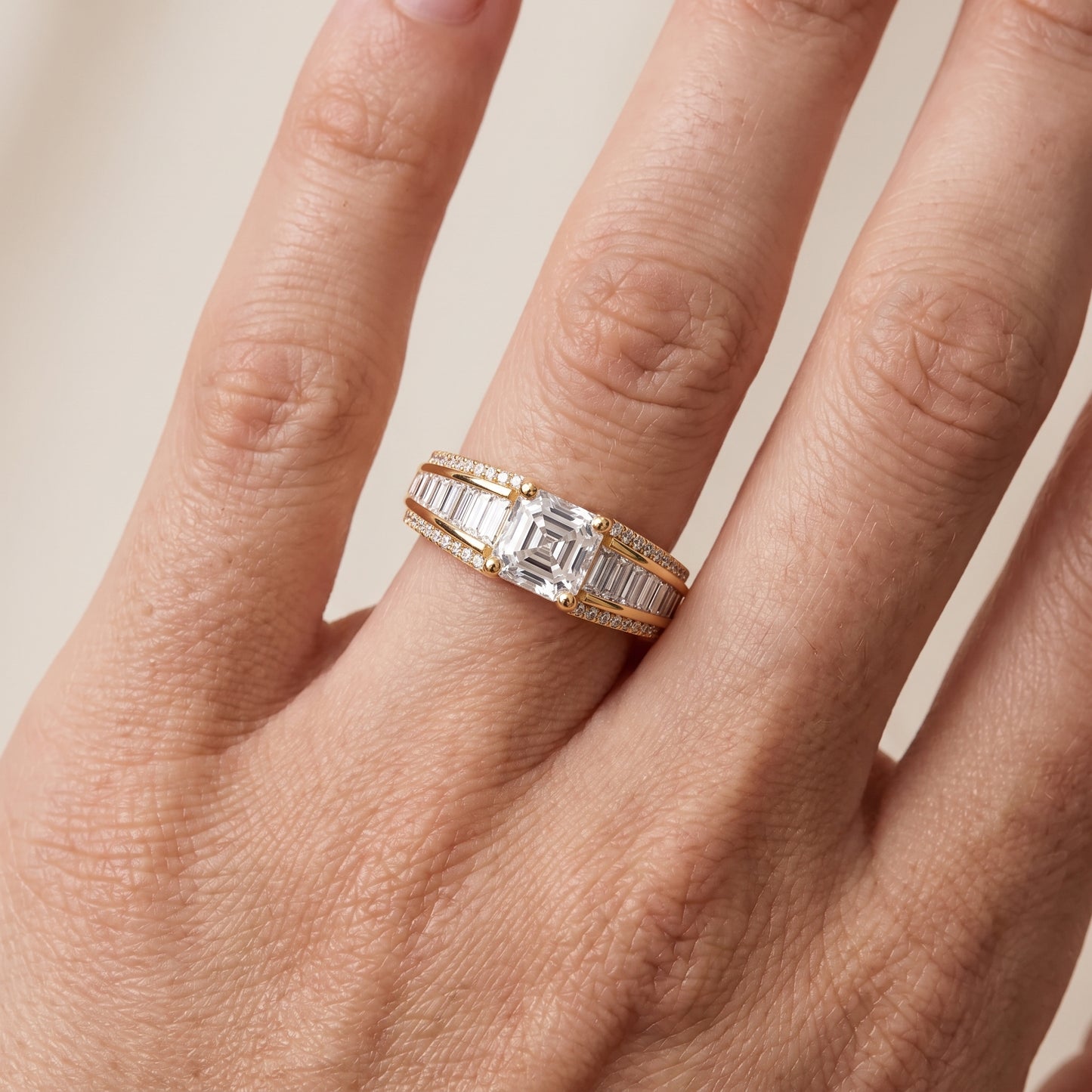Halle Channel Set Baguette Accent Asscher Diamond Engagement Ring in Yellow Gold - lifestyle.jpg