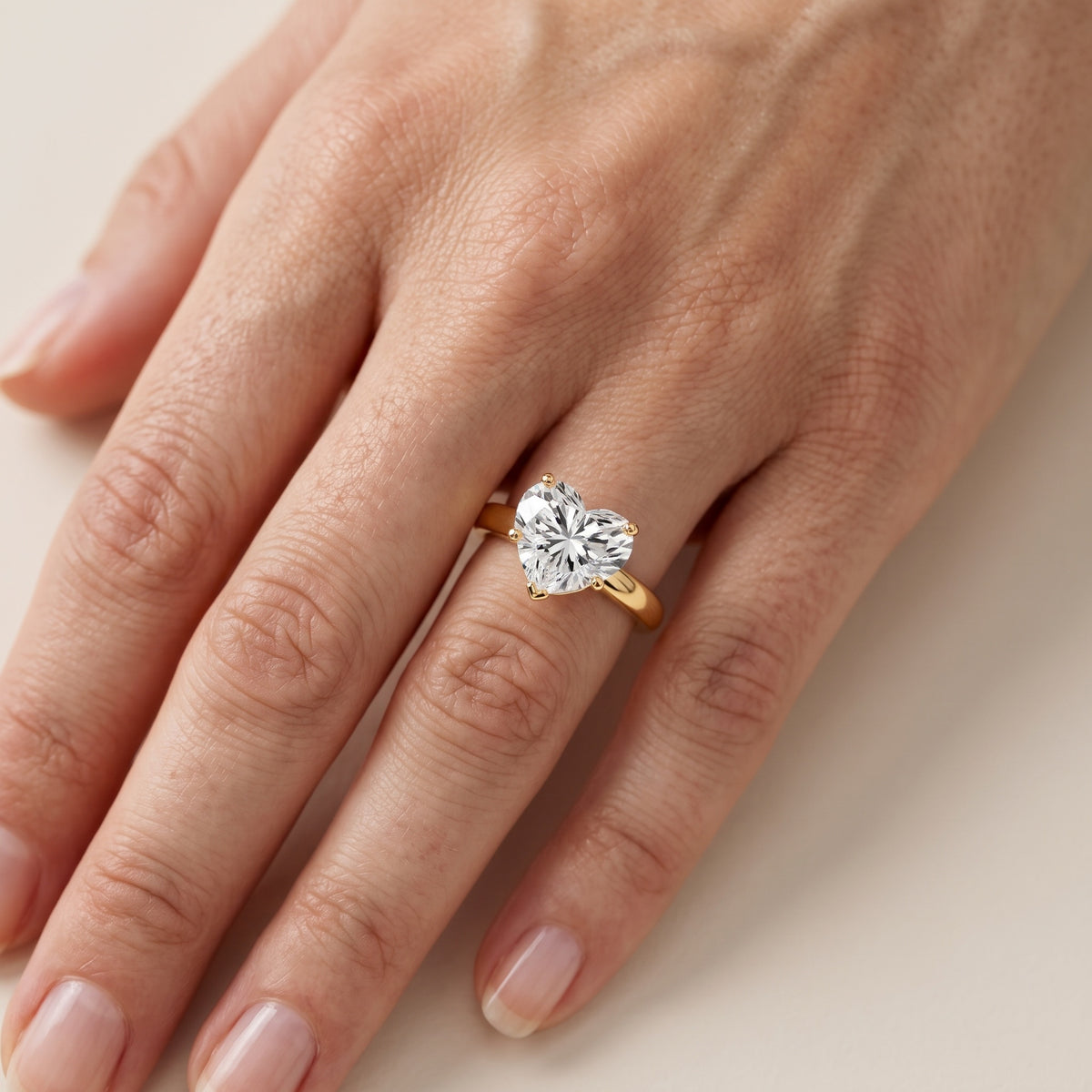 Elspeth Solitaire Heart Diamond Engagement Ring in Silver - lifestyle.jpg