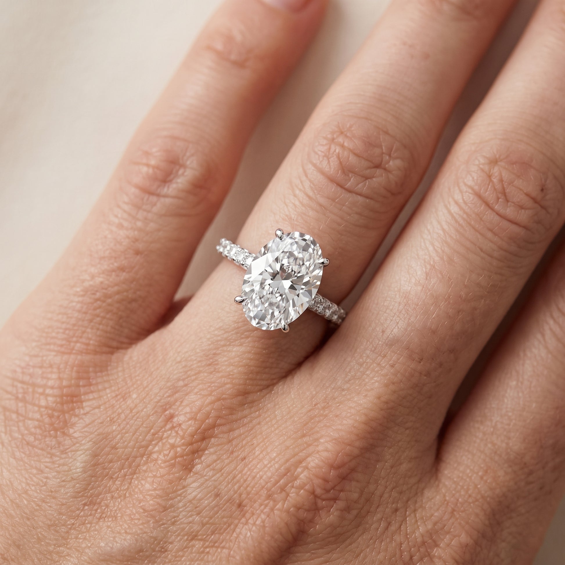 Violet Hidden Halo Pavé Oval Diamond Ring in White Gold - lifestyle.jpg
